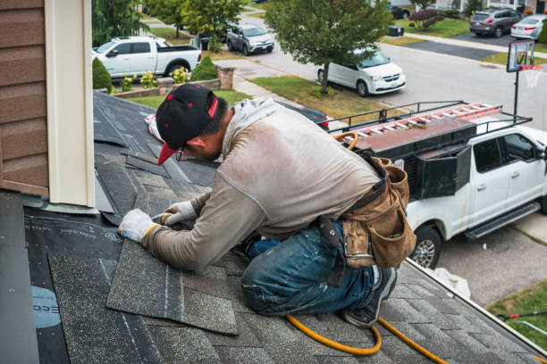 Professional Roofing technician working in Kentfield, CA